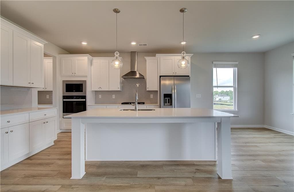 5 bedroom, 5 bathroom, 3,823 sq ft single family residence for sale at 708 Ripple End, Hampton, GA 30228 — photo 8