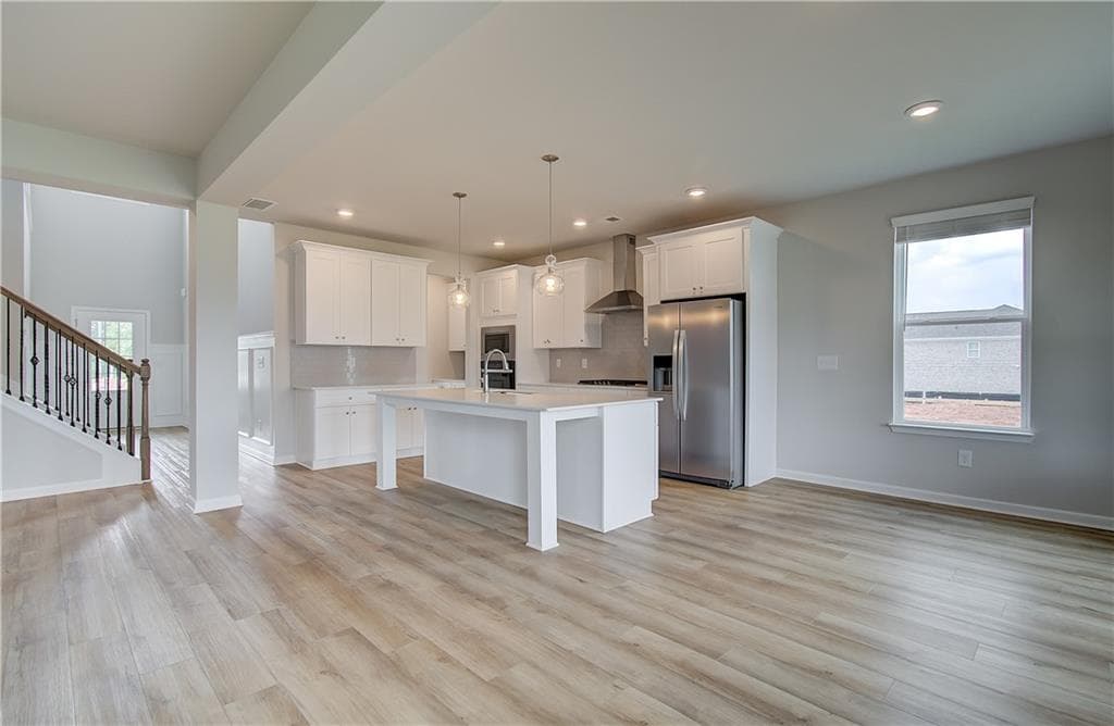 5 bedroom, 5 bathroom, 3,823 sq ft single family residence for sale at 708 Ripple End, Hampton, GA 30228 — photo 9