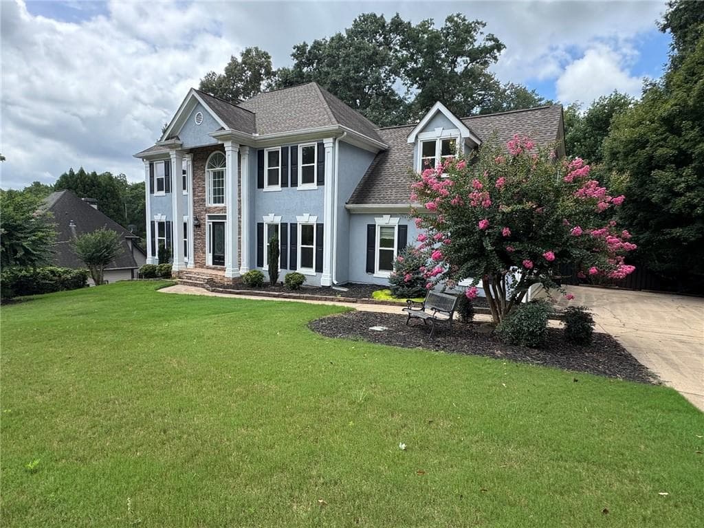 6 bedroom, 4 bathroom, 3,740 sq ft single family residence for sale at 1039 Avery Creek Drive, Woodstock, GA 30188