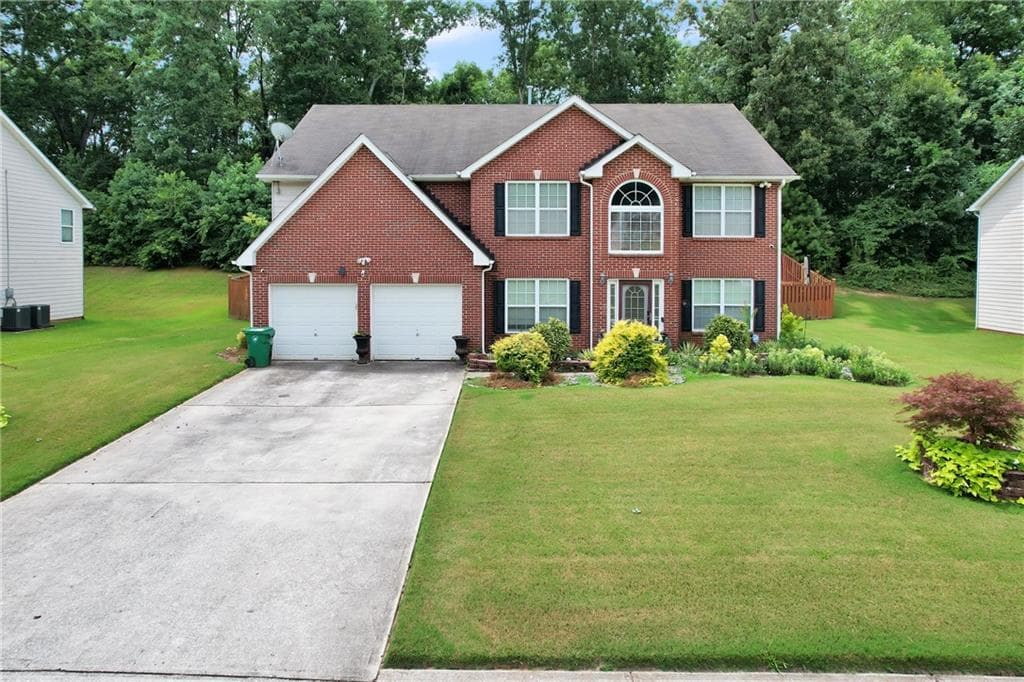 5 bedroom, 4 bathroom, 3,000 sq ft single family residence for sale at 5119 Miller Woods Drive, Decatur, GA 30035