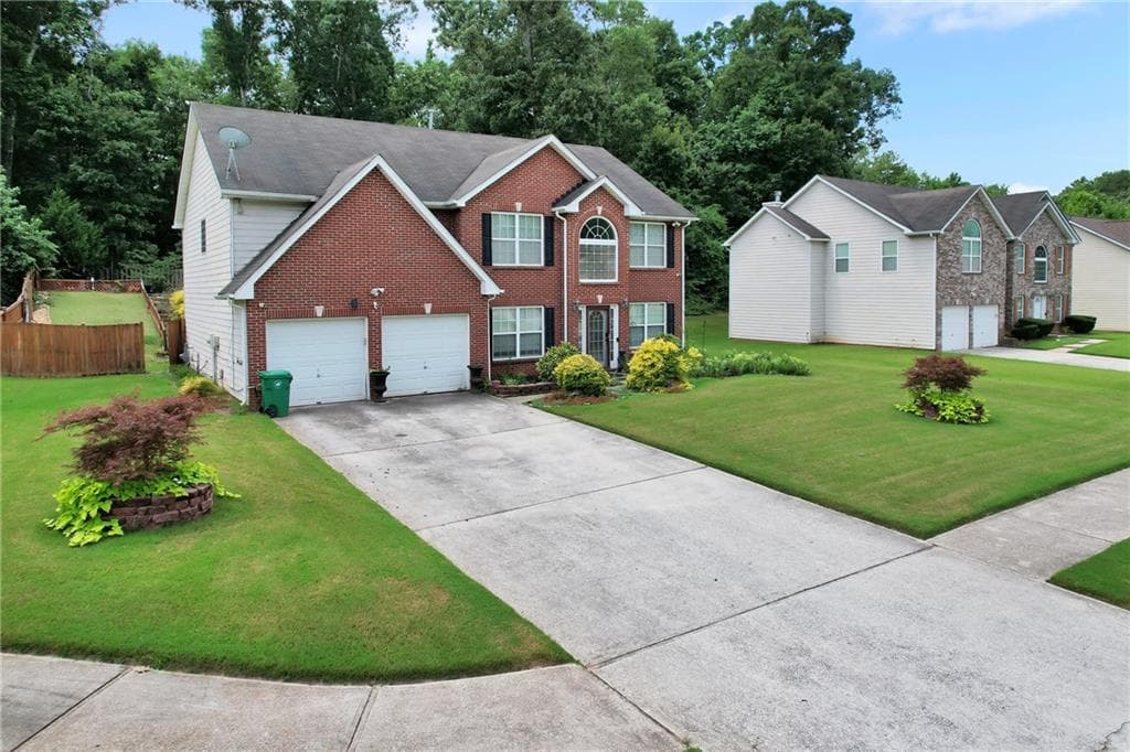 5 bedroom, 4 bathroom, 3,000 sq ft single family residence for sale at 5119 Miller Woods Drive, Decatur, GA 30035 — photo 2
