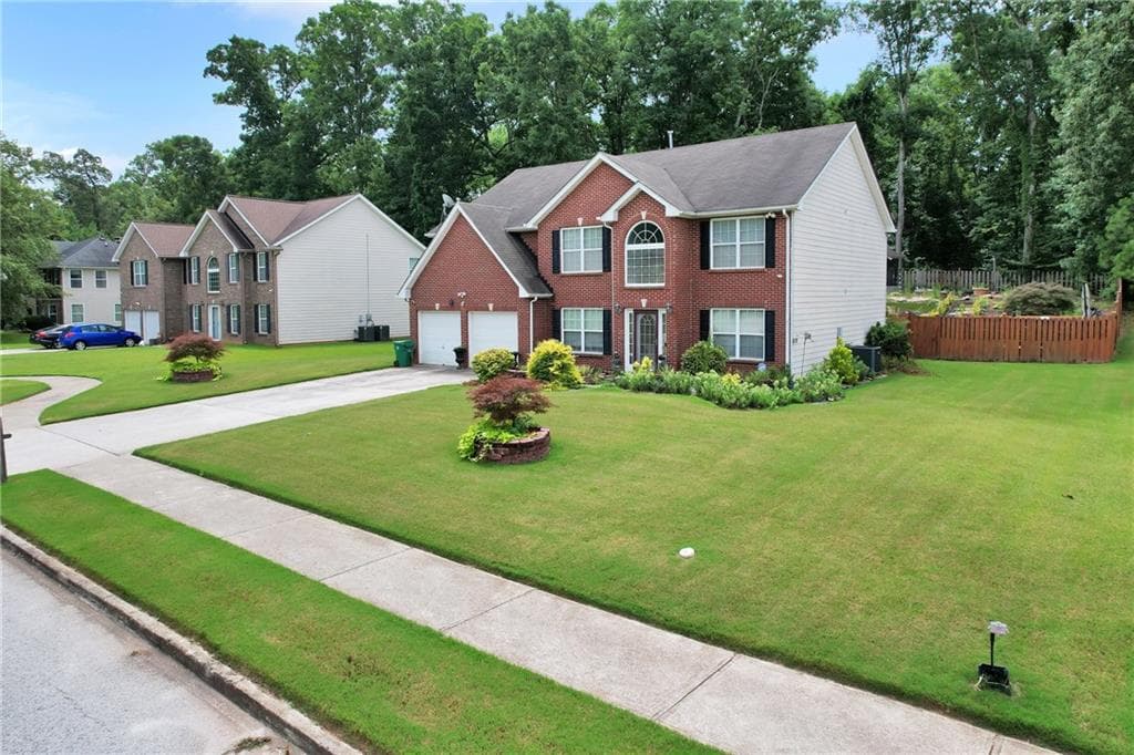 5 bedroom, 4 bathroom, 3,000 sq ft single family residence for sale at 5119 Miller Woods Drive, Decatur, GA 30035 — photo 3