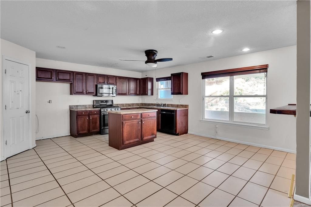 5 bedroom, 4 bathroom, 3,000 sq ft single family residence for sale at 5119 Miller Woods Drive, Decatur, GA 30035 — photo 7