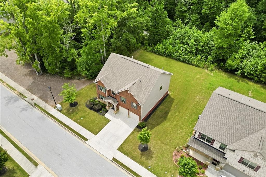 4 bedroom, 3 bathroom, 2,720 sq ft single family residence for rent at 3132 Hawthorn Farm Boulevard, Loganville, GA 30052 for $2,700 a month — photo 4