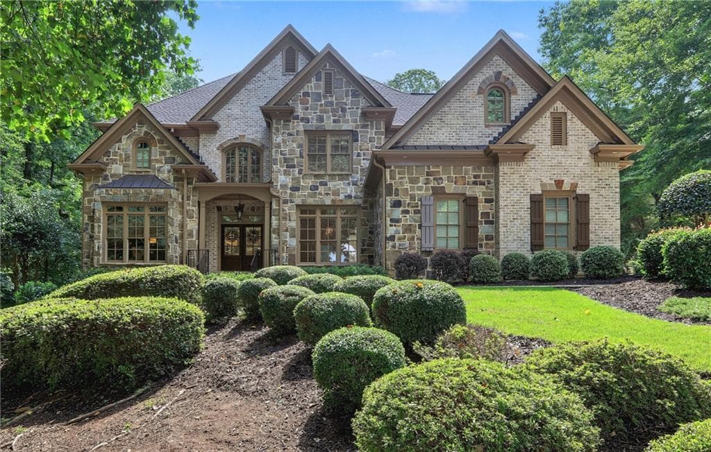 6 bedroom, 7 bathroom, 7,174 sq ft single family residence for sale at 2730 Manor Bridge Drive, Milton, GA 30004 — photo 1 of 90