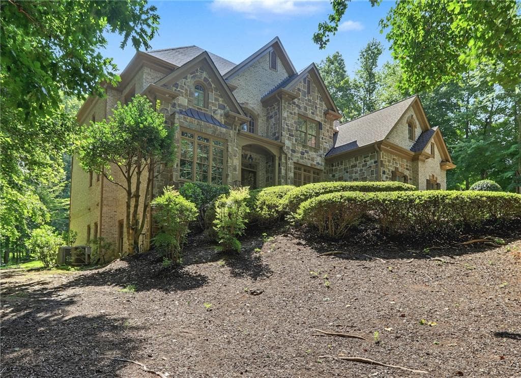 6 bedroom, 7 bathroom, 7,174 sq ft single family residence for sale at 2730 Manor Bridge Drive, Milton, GA 30004 — photo 4