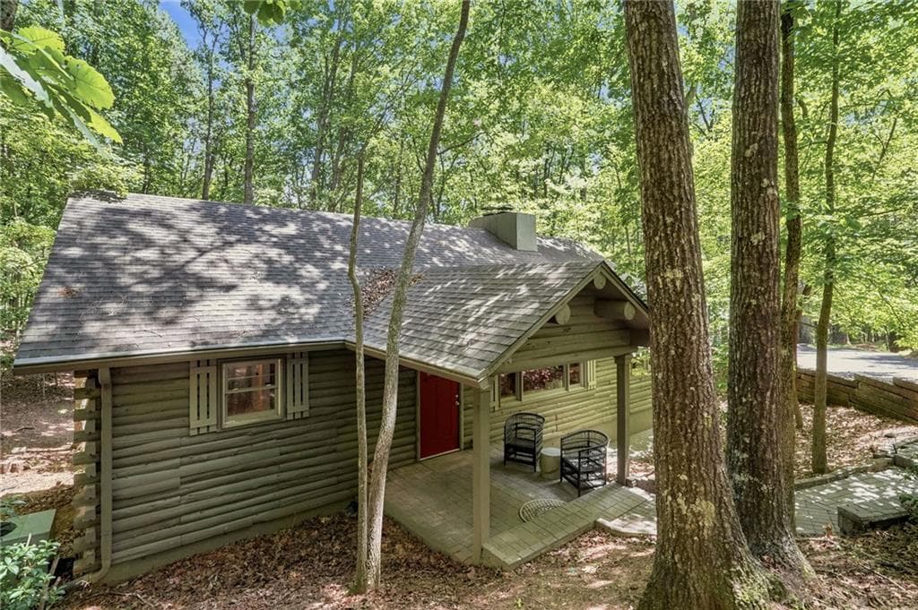 4 bedroom, 2 bathroom, 2,726 sq ft single family residence for sale at 884 Quail Cove Drive, Big Canoe, GA 30143 — photo 1 of 40