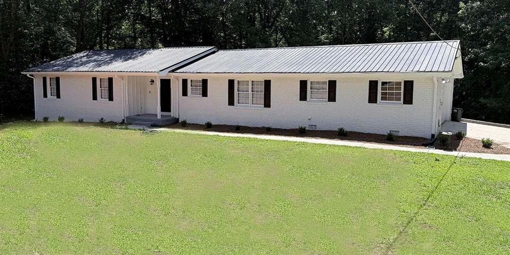 3 bedroom, 2 bathroom, 3,480 sq ft single family residence for sale at 1912 Wildwood Court, Conyers, GA 30094 — photo 1 of 50