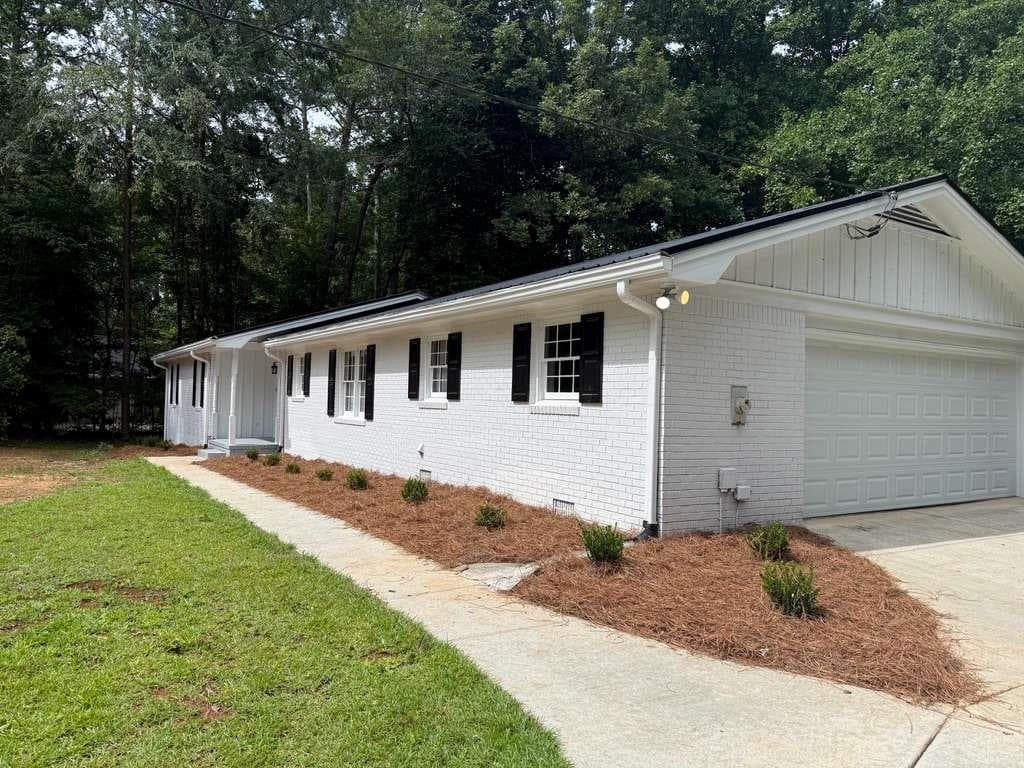 3 bedroom, 2 bathroom, 3,480 sq ft single family residence for sale at 1912 Wildwood Court, Conyers, GA 30094 — photo 2
