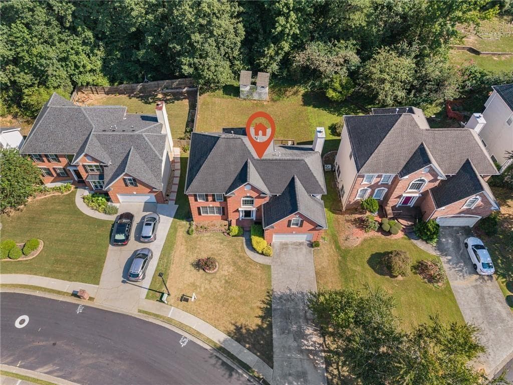 5 bedroom, 4 bathroom, 3,515 sq ft single family residence for sale at 3884 Meandering Way, Lilburn, GA 30047 — photo 2