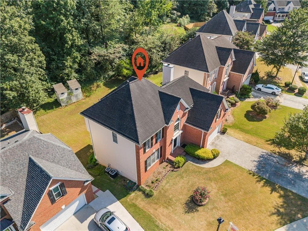 5 bedroom, 4 bathroom, 3,515 sq ft single family residence for sale at 3884 Meandering Way, Lilburn, GA 30047 — photo 4