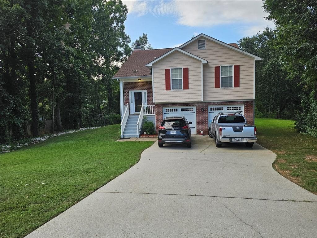 4 bedroom, 3 bathroom, 1,634 sq ft single family residence for sale at 3536 Stonefield Court, Rex, GA 30273 — photo 2