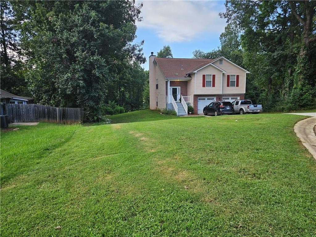 4 bedroom, 3 bathroom, 1,634 sq ft single family residence for sale at 3536 Stonefield Court, Rex, GA 30273 — photo 3