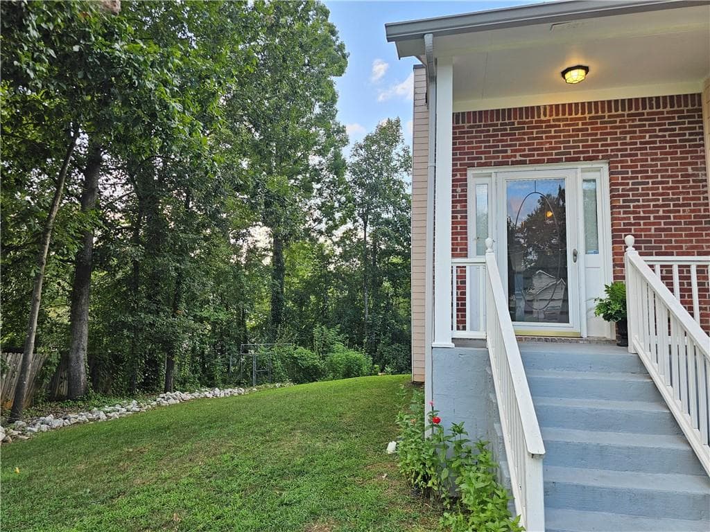 4 bedroom, 3 bathroom, 1,634 sq ft single family residence for sale at 3536 Stonefield Court, Rex, GA 30273 — photo 5