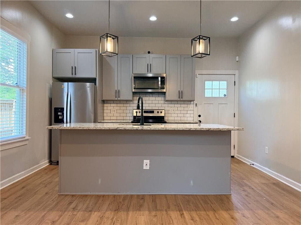 3 bedroom, 2 bathroom, 1,405 sq ft single family residence for rent at 31 Mildred Place, Atlanta, GA 30318 for $2,100 a month — photo 3