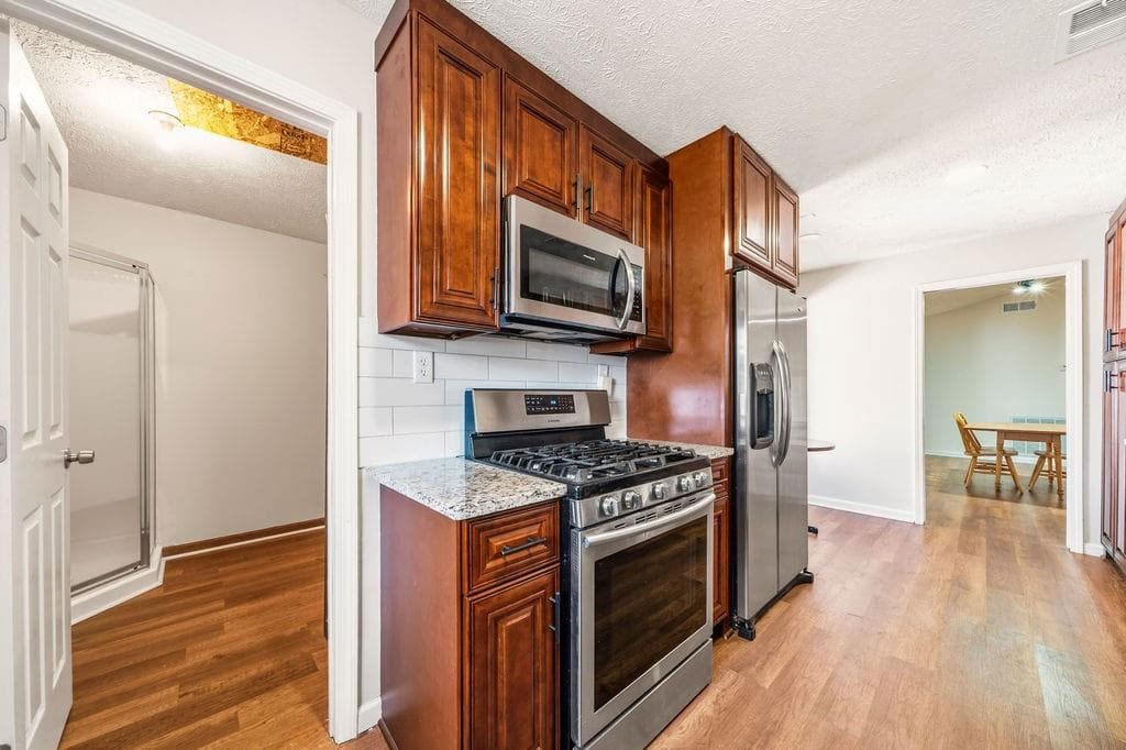 4 bedroom, 3 bathroom, 2,000 sq ft single family residence for sale at 3755 Station Drive, Kennesaw, GA 30144 — photo 8