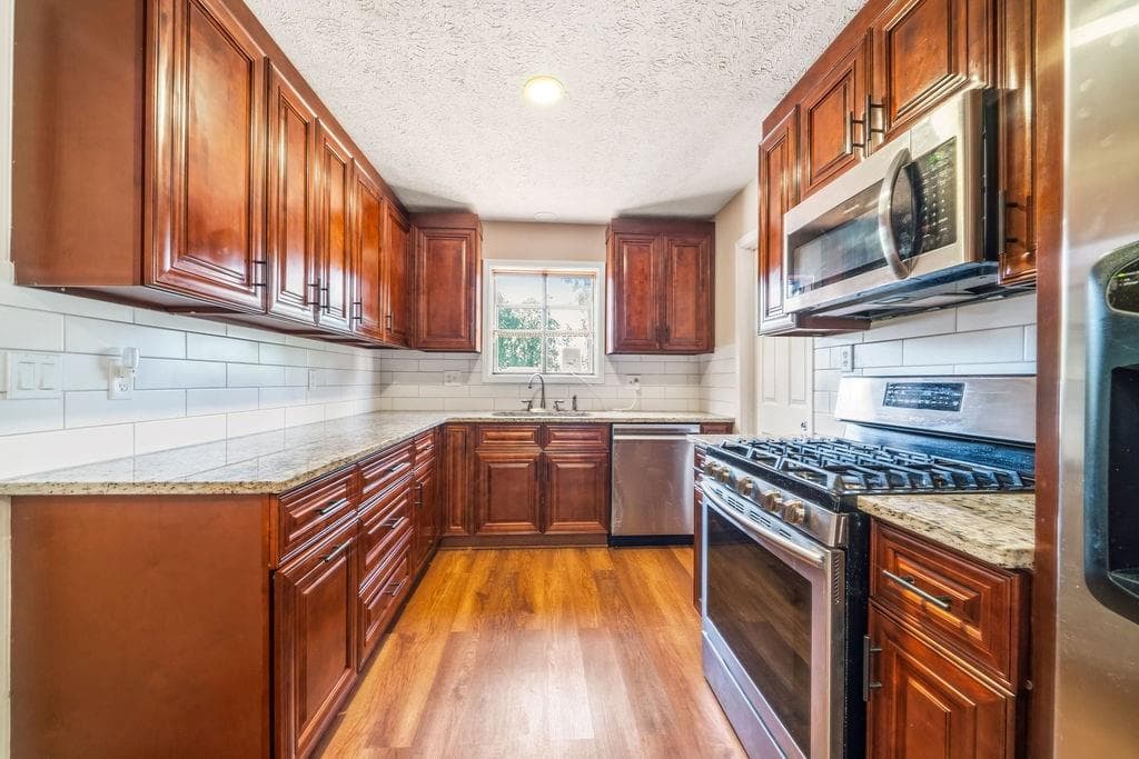 4 bedroom, 3 bathroom, 2,000 sq ft single family residence for sale at 3755 Station Drive, Kennesaw, GA 30144 — photo 5