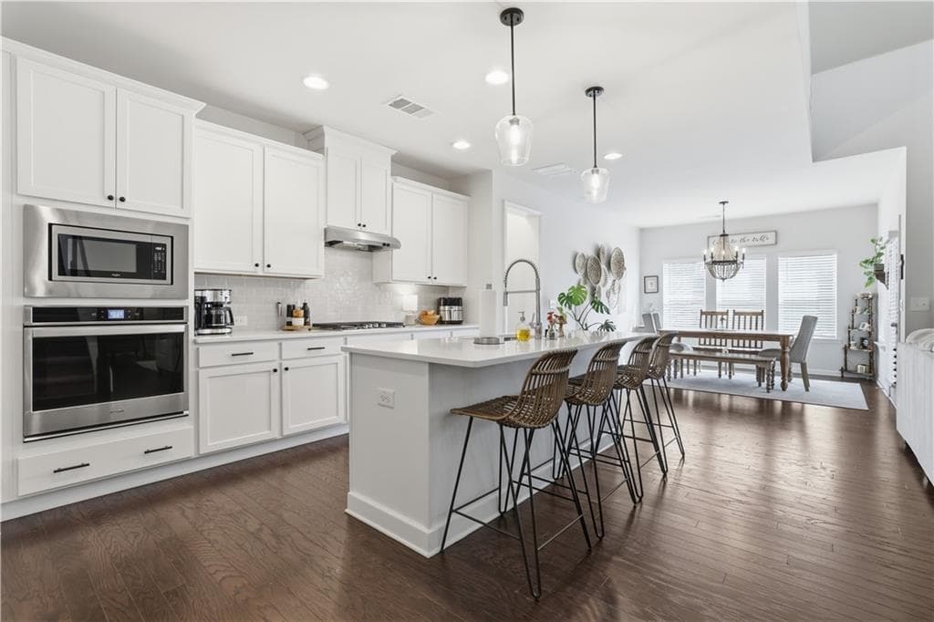 4 bedroom, 3 bathroom, 2,525 sq ft single family residence for sale at 4450 Madison Hall Drive, Cumming, GA 30028 — photo 3