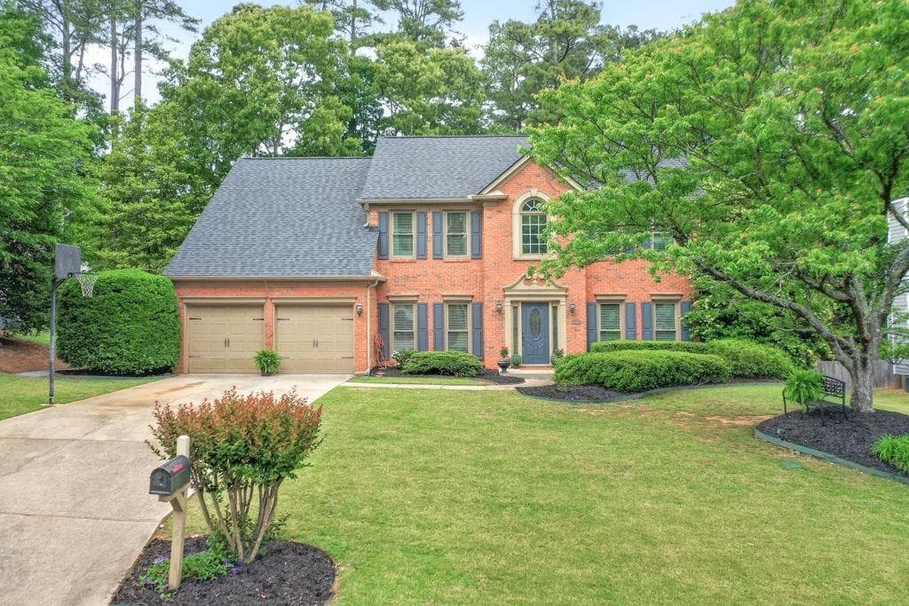 4 bedroom, 3 bathroom, 2,660 sq ft single family residence sold at 7125 Collingsworth Place, Cumming, GA 30041