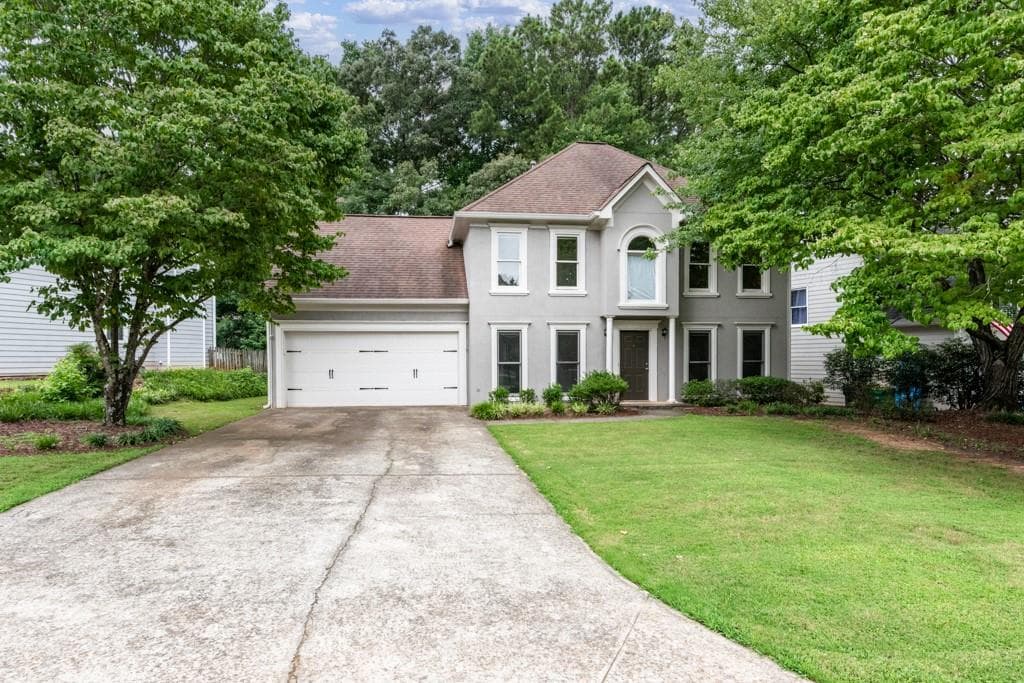4 bedroom, 3 bathroom, 1,968 sq ft single family residence for sale at 4031 Dream Catcher Drive, Woodstock, GA 30189