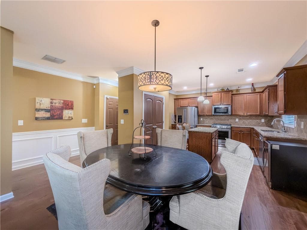5 bedroom, 3 bathroom, 3,767 sq ft single family residence for sale at 40 Village Green Court, Lilburn, GA 30047 — photo 5