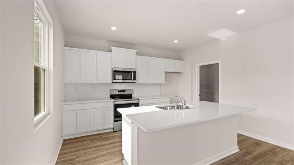 4 bedroom, 3 bathroom, 2,338 sq ft single family residence for sale at 309 Faulkner Street, Stockbridge, GA 30281 — photo 5