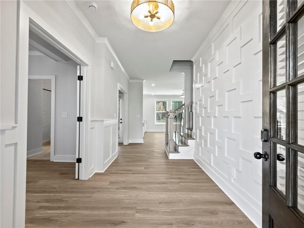 5 bedroom, 4 bathroom, 3,300 sq ft single family residence for sale at 4250 Hosch Reserve Drive, Buford, GA 30519 — photo 2