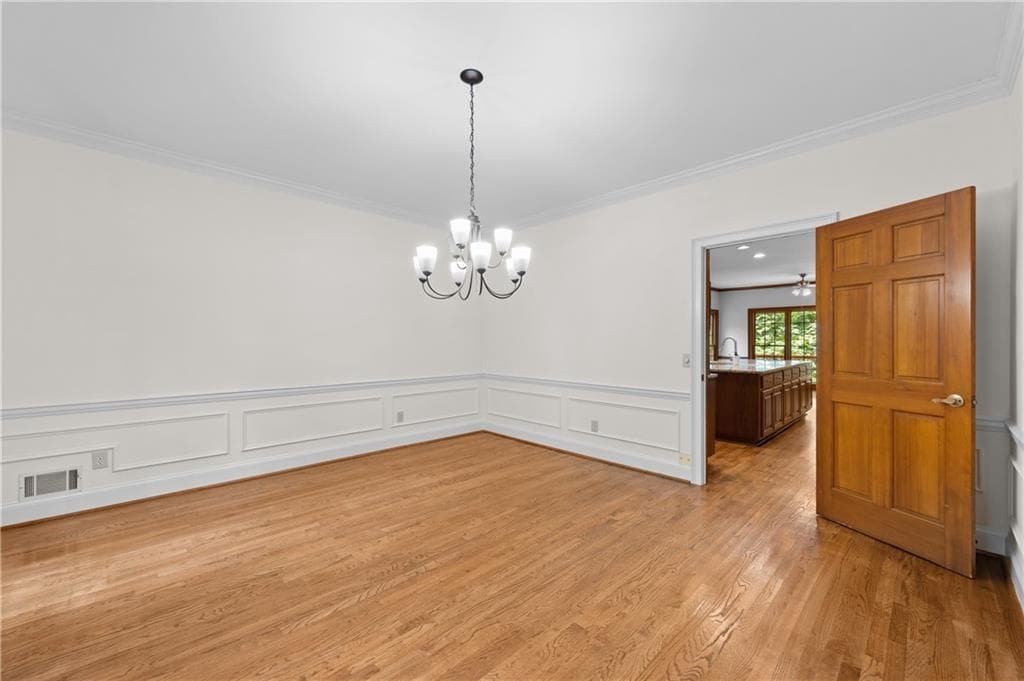 5 bedroom, 6 bathroom, 6,610 sq ft single family residence for sale at 9335 Huntcliff Trace, Sandy Springs, GA 30350 — photo 9