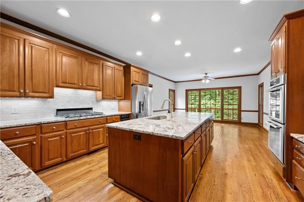 5 bedroom, 6 bathroom, 6,610 sq ft single family residence for sale at 9335 Huntcliff Trace, Sandy Springs, GA 30350 — photo 10