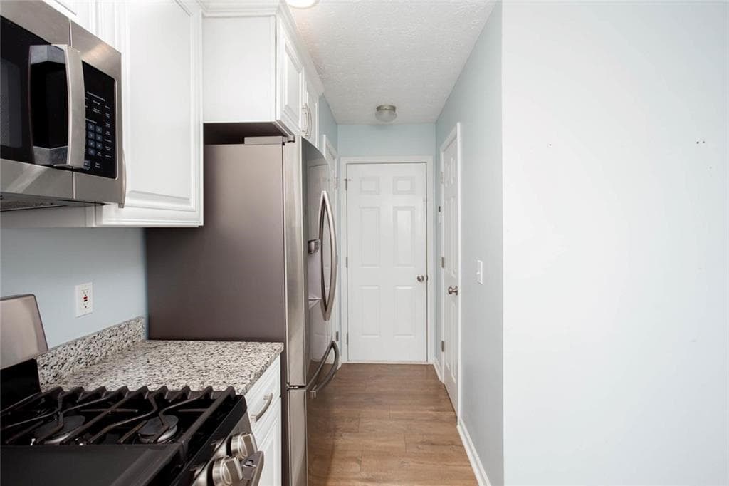 2 bedroom, 3 bathroom, 1,314 sq ft single family residence under contract at 126 W Oaks Place, Woodstock, GA 30188 — photo 7