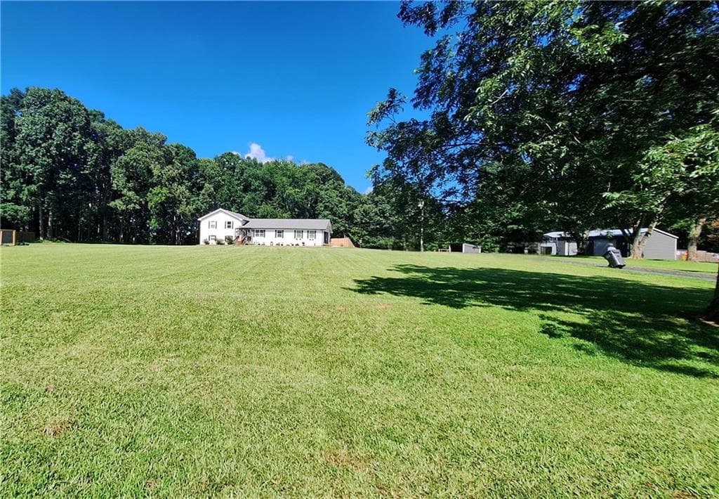 5 bedroom, 3 bathroom, 2,580 sq ft single family residence for sale at 2107 Henderson Mill Road, Covington, GA 30014 — photo 3