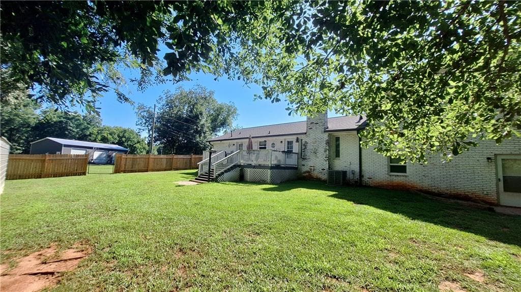 5 bedroom, 3 bathroom, 2,580 sq ft single family residence for sale at 2107 Henderson Mill Road, Covington, GA 30014 — photo 5