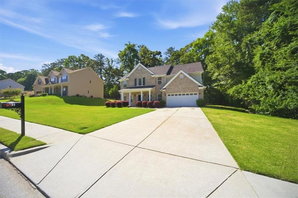 5 bedroom, 3 bathroom, 2,935 sq ft single family residence for sale at 861 Wisteria View Court, Dacula, GA 30019 — photo 4