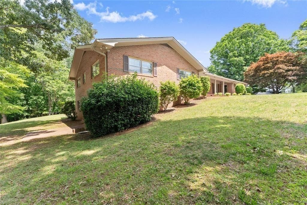4 bedroom, 3 bathroom, 4,364 sq ft single family residence for sale at 4118 Mountain View Road, Oakwood, GA 30566 — photo 5