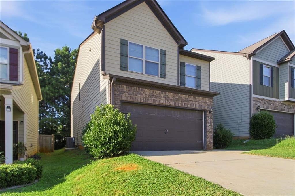 4 bedroom, 3 bathroom, 2,005 sq ft single family residence for sale at 5558 Union Pointe Place, Union City, GA 30291 — photo 2