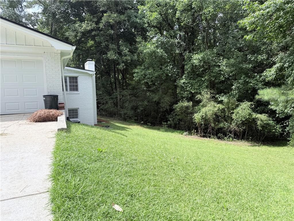 3 bedroom, 2 bathroom, 3,480 sq ft single family residence for sale at 1912 Wildwood Court, Conyers, GA 30094 — photo 4