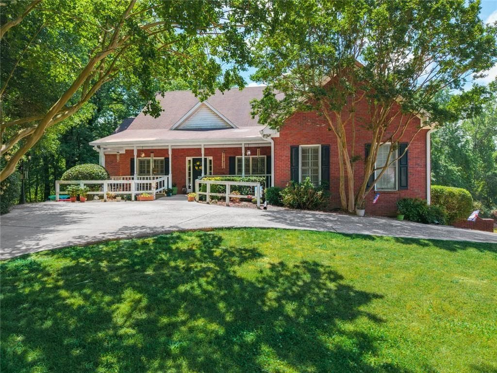 4 bedroom, 3 bathroom, 4,161 sq ft single family residence for sale at 5030 Pine Mountain Road, Kennesaw, GA 30152 — photo 1 of 31