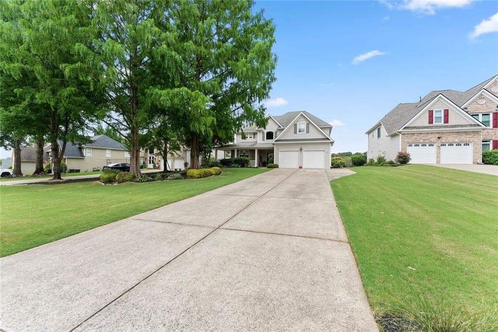 4 bedroom, 4 bathroom, 3,507 sq ft single family residence for sale at 5305 Glenhaven Drive, Cumming, GA 30041 — photo 2