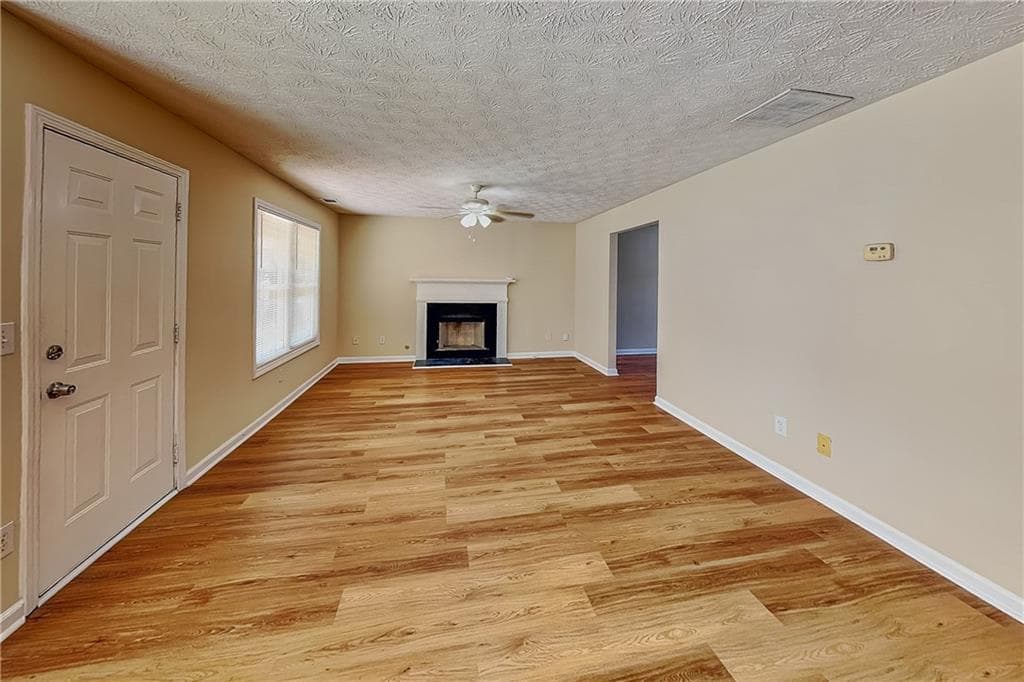 4 bedroom, 3 bathroom, 2,318 sq ft single family residence for rent at 1867 Harmony Trace, Lithonia, GA 30058 for $2,050 a month — photo 2