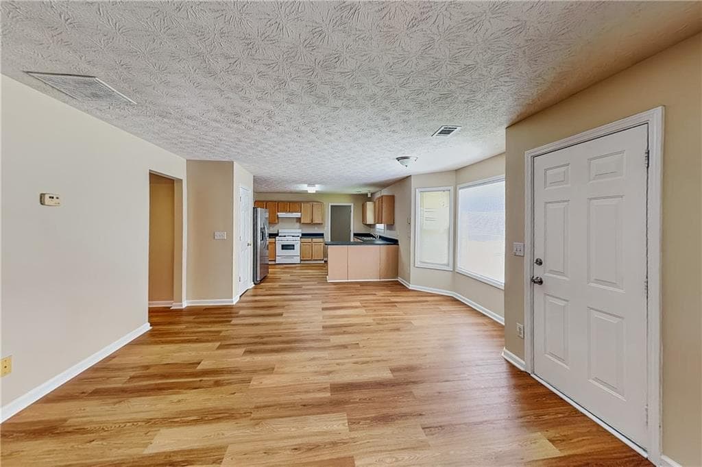 4 bedroom, 3 bathroom, 2,318 sq ft single family residence for rent at 1867 Harmony Trace, Lithonia, GA 30058 for $2,050 a month — photo 3