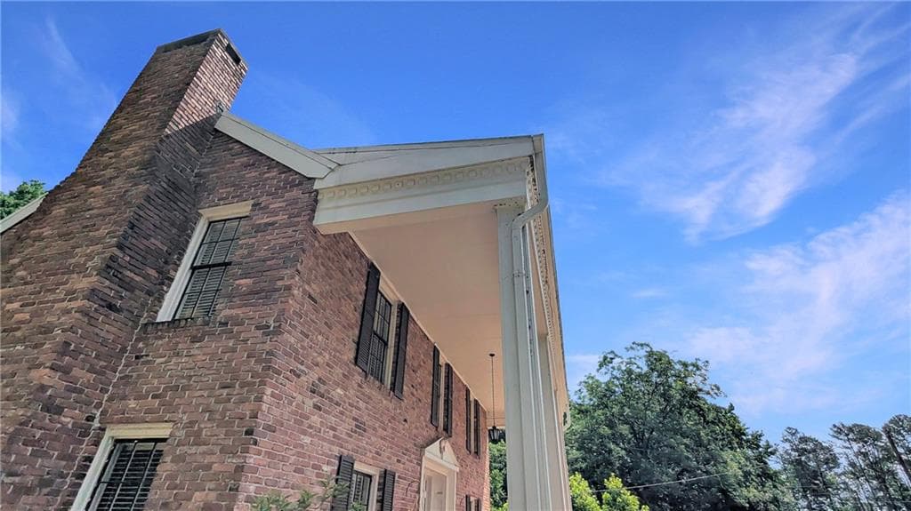 3 bedroom, 2 bathroom, 2,304 sq ft single family residence for sale at 7855 Rivertown Road, Fairburn, GA 30213 — photo 4