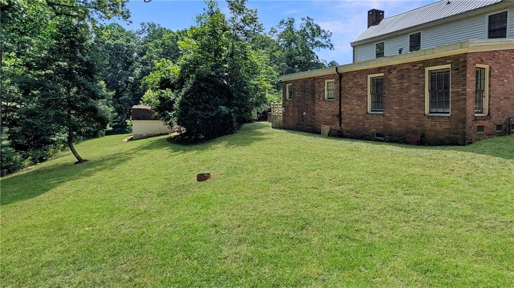 3 bedroom, 2 bathroom, 2,304 sq ft single family residence for sale at 7855 Rivertown Road, Fairburn, GA 30213 — photo 5