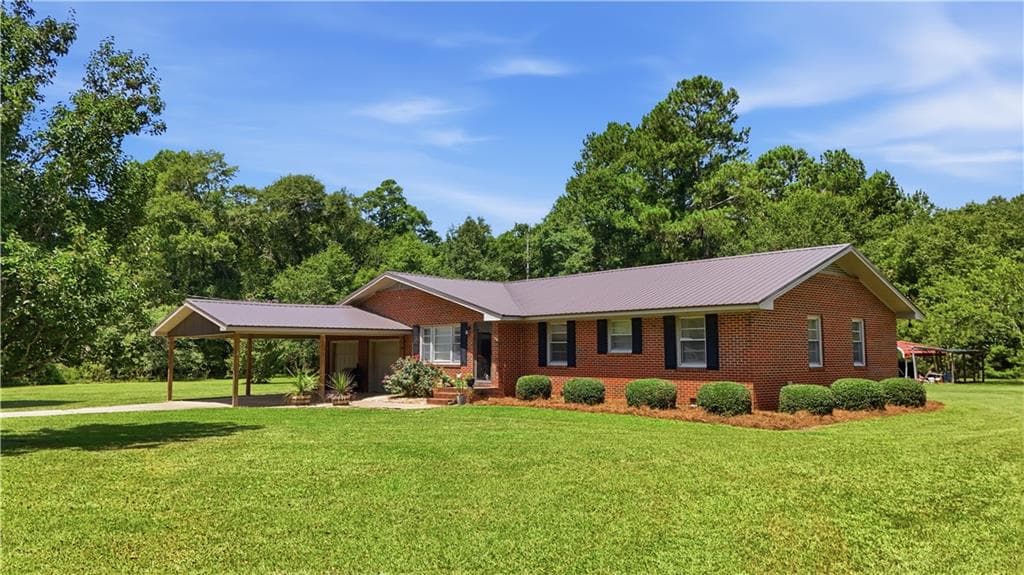 4 bedroom, 2 bathroom, 1,689 sq ft single family residence for sale at 420 W Ashley Street, Rebecca, GA 31783 — photo 2