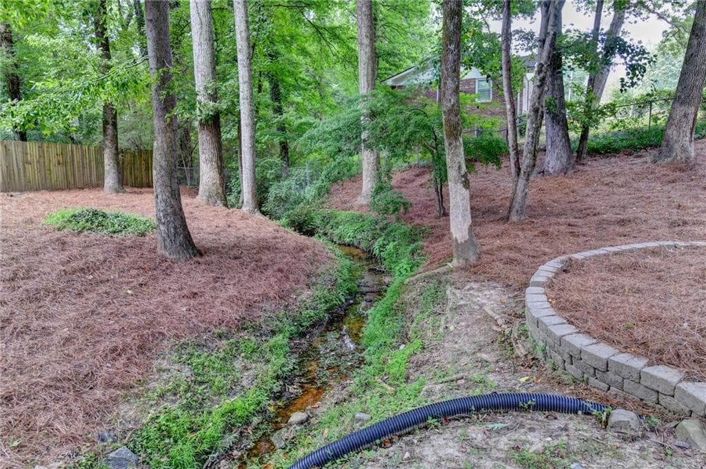 4 bedroom, 3 bathroom, 2,620 sq ft single family residence for sale at 131 Denna Drive, Alpharetta, GA 30009 — photo 3