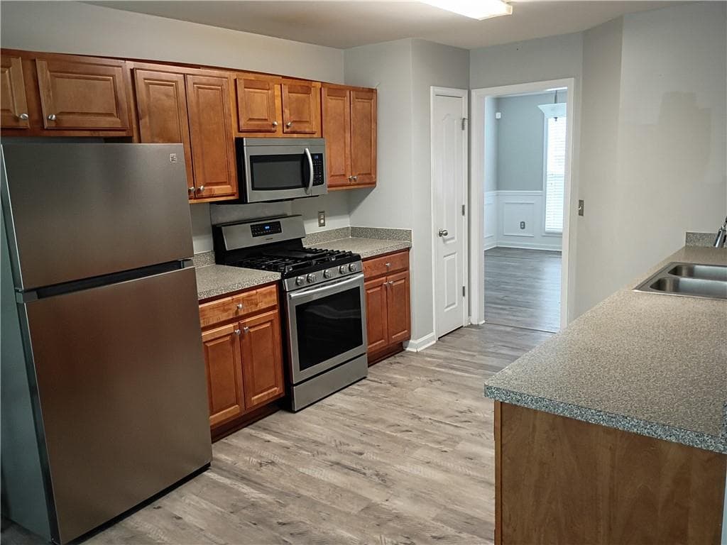 4 bedroom, 3 bathroom, 2,435 sq ft single family residence for sale at 5714 Flowers Ridge Road, Powder Springs, GA 30127 — photo 5