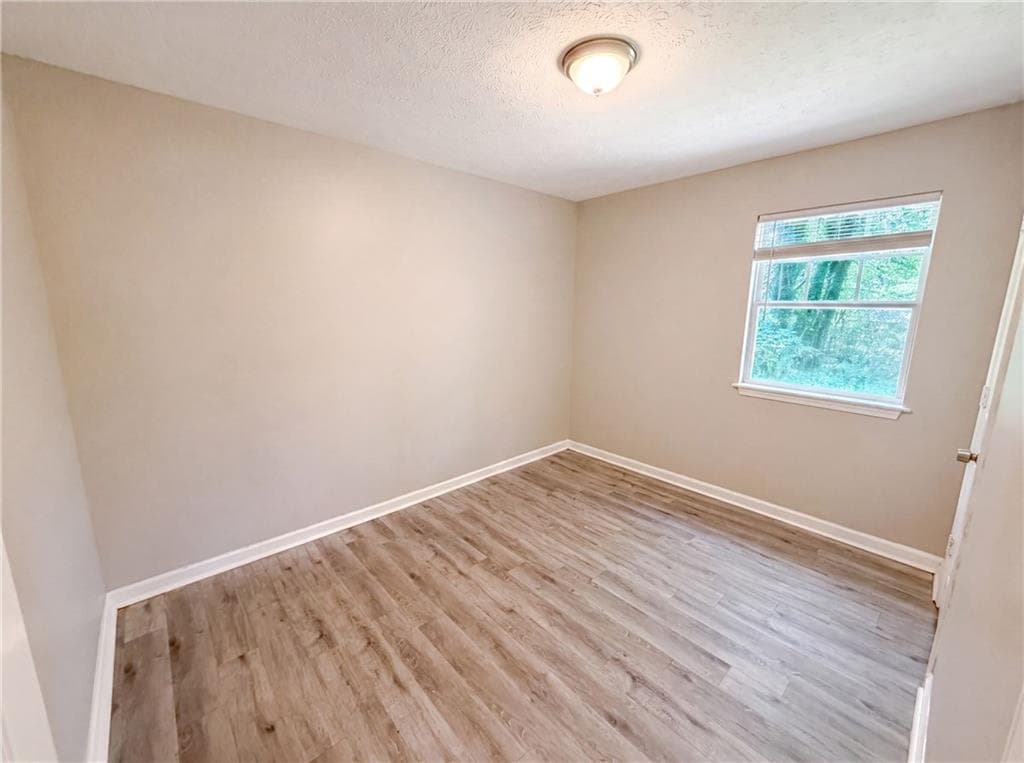 3 bedroom, 2 bathroom, 1,320 sq ft single family residence for sale at 5067 Redan Road, Stone Mountain, GA 30088 — photo 9