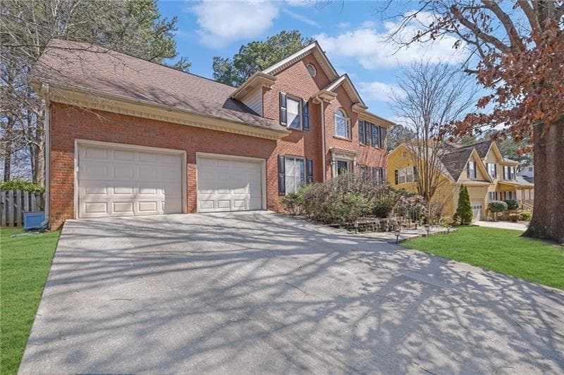 6 bedroom, 3 bathroom, 3,670 sq ft single family residence for sale at 1069 Sunny Field Lane, Lawrenceville, GA 30043