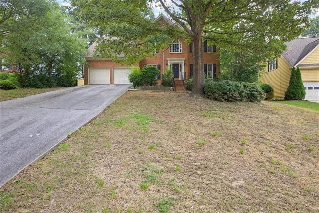 6 bedroom, 3 bathroom, 3,670 sq ft single family residence for sale at 1069 Sunny Field Lane, Lawrenceville, GA 30043 — photo 3