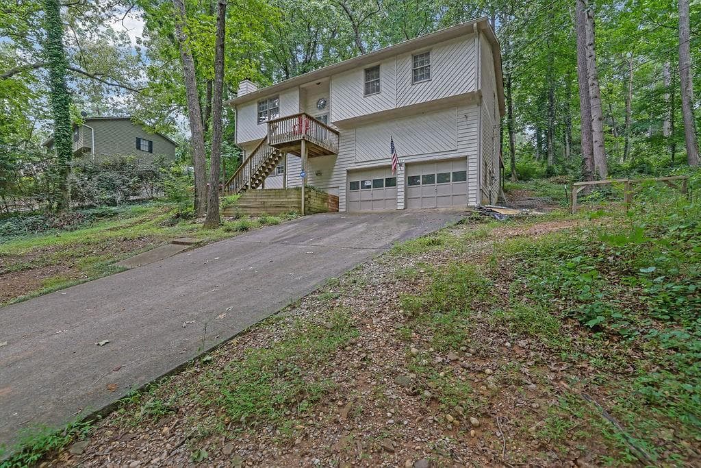 4 bedroom, 2 bathroom, 1,850 sq ft single family residence for sale at 131 Little Brook Drive, Woodstock, GA 30188 — photo 2