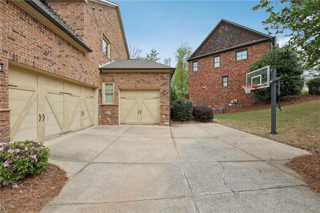 6 bedroom, 5 bathroom, 5,712 sq ft single family residence for sale at 1710 Bramble Bush Way, Suwanee, GA 30024 — photo 5